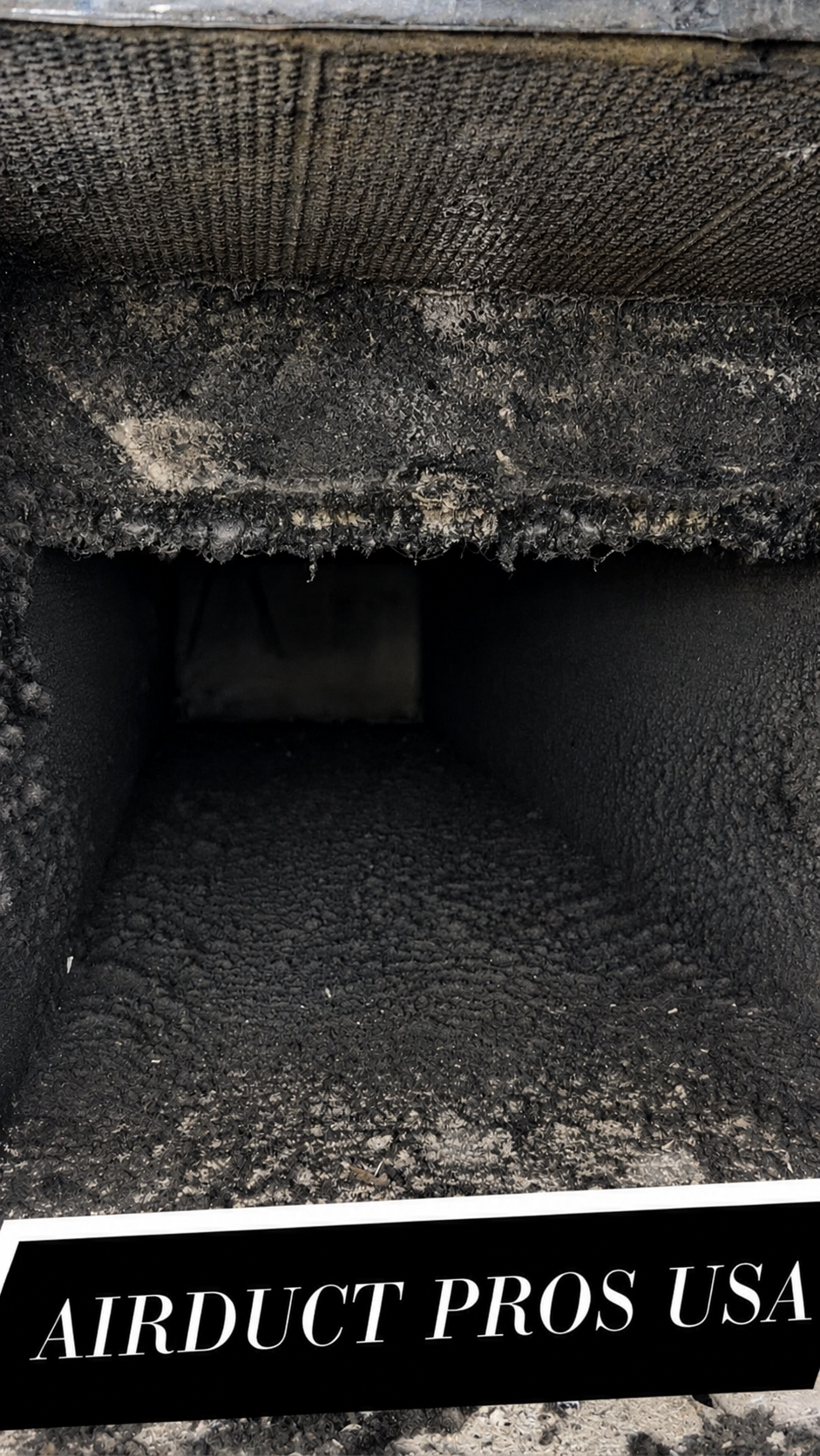 Before air duct cleaning — severely dirty air duct — Air Duct Pros USA