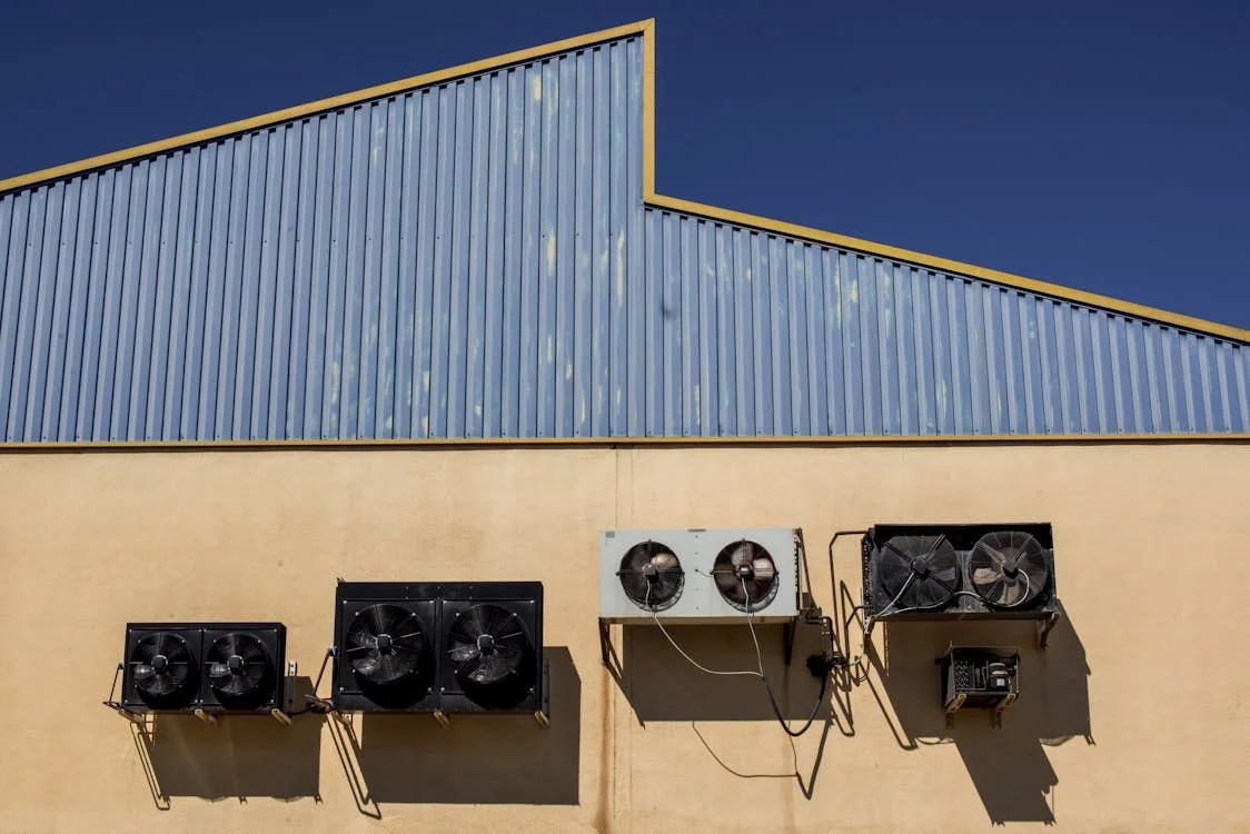 Commercial AC installation crane lift — Air Duct Pros USA
